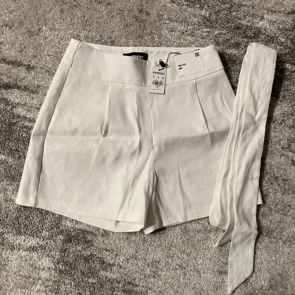 Brand new with tags. Express high-rise midi shorts.